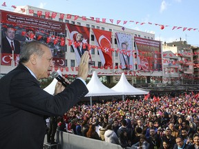 Turkey's President Recep Tayyip Erdogan addresses his supporters in Manisa, Turkey, Friday, Feb. 24, 2017.