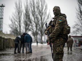 A Ukrainian soldier patrols in Avdiivka, Ukraine, Feb. 4, 2017. Fighting in eastern Ukraine sharply escalated in recent weeks.