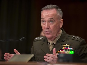 FILE - In this April 27, 2016 file photo, Joint Chiefs Chairman Gen. Joseph Dunford Jr. testifies on Capitol Hill in Washington. Dunford said Thursday, Feb. 23, 2017, a Pentagon-led review of strategy for defeating the Islamic State group will present President Donald Trump with options not just to speed up the fight against IS but also to combat al-Qaida and other extremist groups beyond Iraq and Syria.  (AP Photo/Manuel Balce Ceneta, File)