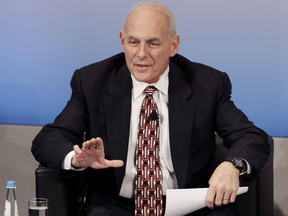 FILE - In this Feb. 18, 2017 file photo, Homeland Security Secretary John Kelly speaks in Munich, Germany. President Donald Trump is sending Secretary of State Rex Tillerson and Kelly to Mexico on a fence-mending mission made all the more challenging by the actual fence he wants to build on the southern border. (AP Photo/Matthias Schrader)