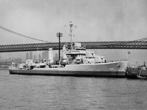 This undated file photo provided by the U.S. Navy shows the USS Turner on the East River in New York City near the Williamsburg Bridge.