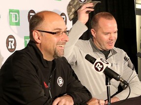 Happier times: Ottawa Redblacks general manager Marcel Desjardins and head coach Rick Campbell were all smiles after winning the Grey Cup in November.