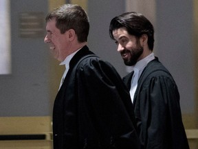 Crown prosecutor Dennis Galiatsatos, right, leaves the Quebec Court of Appeal courtroom during the Mitra Javanmardi hearings
