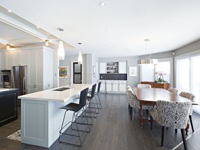 The revamped kitchen/dining area opened up the whole living space and brought the beautiful, big windows into the room.