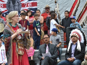 Carolyn Bennett, Minister of Indigenous and Northern Affairs speaking as Amarjeet Sohi, Minister of Infrastructure and Communities, and Chief of Enoch Cree Nation Billy Morin listening, as an information session was held at Enoch Cree Nation on the new Canada Child Benefit which started today in Edmonton, Wednesday, July 20, 2016.