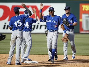 Toronto Blue Jays players celebrate following a Grapefruit League spring training game against the Pittsburgh Pirates at McKechnie Field on February 28, 2017 in Bradenton, Florida. The Blue Jays defeated the Pirates 12-0.