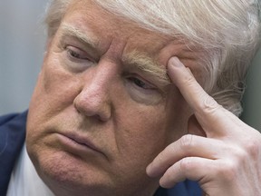 President Donald Trump attends a meeting in the Roosevelt Room of the White House on March 13, 2017