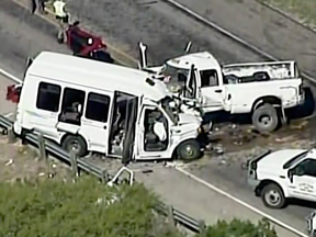 The scene of a deadly crash involving a van carrying church members and a pickup truck on U.S. 83 outside Garner State Park in northern Uvalde County, Texas, Wednesday, March 29, 2017.