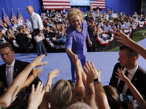 Democratic presidential nominee Hillary Clinton greets supporters after a campaign rally with Vice President Joe Biden, August 15, 2016, in Scranton, Pennsylvania.