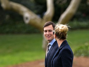 Senior Advisor to the President, Jared Kushner (L), walks with his wife Ivanka Trump to board Marine One at the White House in Washington, DC, on March 3, 2017.   The two are travelling with US President Donald Trump to Florida.
