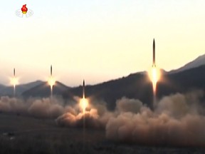 This screen grab taken from North Korean broadcaster KCTV on March 7, 2017 shows ballistic missiles being launced during a military drill from an undisclosed location in North Korea.