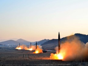 This undated picture released by North Korea's Korean Central News Agency (KCNA) via KNS on March 7, 2017 shows the launch of four ballistic missiles by the Korean People's Army