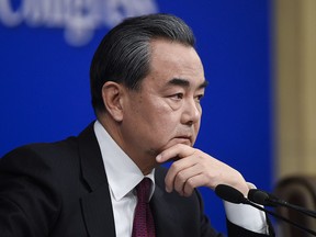 China's Foreign Minister Wang Yi prepares to answer a question at a press conference during the Fifth Session of the 12th National People's Congress (NPC) in Beijing on March 8, 2017.
