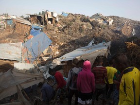 The landslide late on March 11 saw dozens of homes of people living in the dump levelled after a part of the largest pile of rubbish at the Koshe landfill collapsed, an AFP journalist said