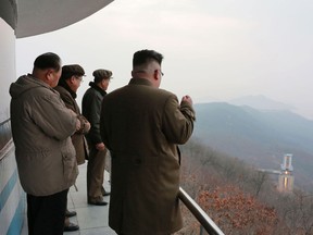 This undated picture released by North Korea's official Korean Central News Agency (KCNA) on March 19, 2017 shows North Korean leader Kim Jong-Un inspecting the ground jet test of a newly developed high-thrust engine at the Sohae Satellite Launching Ground in North Korea.
