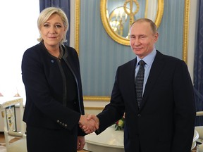 Russian President Vladimir Putin meets with French presidential election candidate for the far-right Front National (FN) party Marine Le Pen at the Kremlin in Moscow on March 24, 2017.