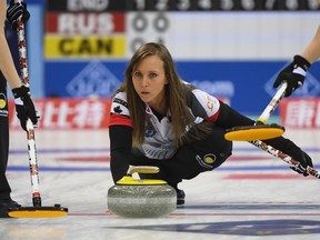 Canada's Rachel Homan releases the stone during their match against Russia at the Women's Curling World Championships in Beijing on March 24, 2017.