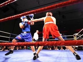 In this March 31, 2012 file photo, Justin Trudeau (right) and Patrick Brazeau box in Ottawa.