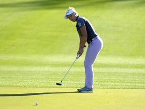 Brooke Henderson attempts a putt on the first hole of the ANA Inspiration on the Dinah Shore Tournament Course at Mission Hills Country Club in Rancho Mirage, Calif., on March 30.