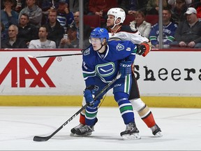 Vancouver Canucks forward Brock Boeser (left) plays against the Anaheim Ducks on March 28.