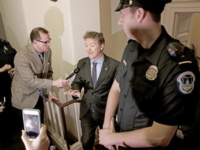 Sen. Rand Paul, R-Ky. holds an impromptu news conference outside a room on Capitol Hill in Washington, Thursday, March 2, 2017.