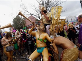 Revellers congregate at the start of the Society of Saint Anne Mardi Gras parade in New Orleans, Feb. 28, 2017.