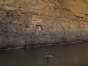 The Santa Elena Canyon in the Rio Grande river and a cliff that is Mexico