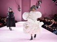 Models walk the runway during the Comme des Garcons Fall 2017 collection show as part of Paris Fashion Week.