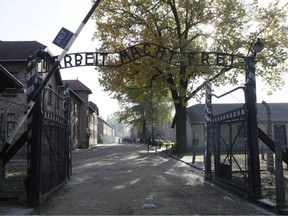 The entrance — with the inscription "Arbeit Macht Frei" (Work Sets You Free) — gate of the former German Nazi death camp of Auschwitz is seen at the Auschwitz-Birkenau memorial in Oswiecim, Poland.