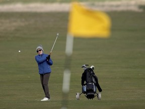 Jeanette Siehenthiler plays on the 18th hole at Muirfield Golf Club Gullane, Scotland, on March 14, after it was announced that the club will admit woman as members for the first time in its 273-year history.