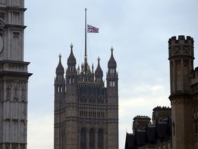 The flag above the Houses of Parliament flies at half mast,  the day after a terrorist attack in London, Britain, Thursday March 23, 2017.