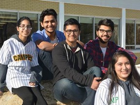 Members of Campbell Collegiate’s WE Schools group (left to right): Aqsa Hussain, Sharjeel Arif, Musaab Siddiqui, Rayyan Aqueel, and Yashica Bither