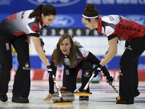 Canada is in first place at the world women's curling championship.