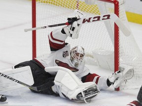 Arizona Coyotes goalie Mike Smith sprawls for a save against the Buffalo Sabres on March 2.