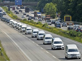 A convoy of hearses drives on the highway in Duisburg, Germany, June 10, 2015 taking home victims who died in the Germanwings plane crash.