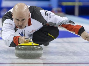 Kevin Koe competes during the gold medal game between Canada and Denmark at the world men's curling championship on April 10, 2016.