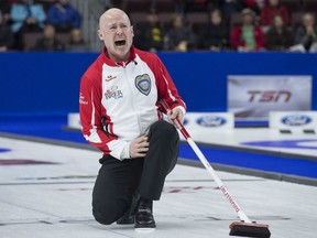 Team Canada skip Kevin Koe reacts to a shot as they play Manitoba in semifinal action at the Tim Hortons Brier at Mile One Centre, in St. John's on Saturday night.