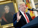 U.S. President Donald Trump speaks before signing an executive order regarding trade in the Oval Office of the White House on March 31, 2017.