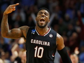 Duane Notice of Woodbridge, Ont. reacts after South Carolina's upset 88-81 victory over the Duke Blue Devils in Sunday second-round action at the NCAA men's basketball championship. Notice had 17 points as the seventh seeded South Carolina knocked off the No. 2 seeded Blue Devils.