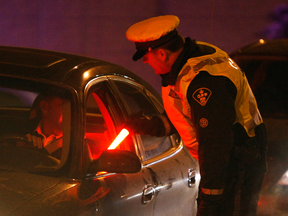 A police officer interviews drivers during a ride program. The ruling in the Kimberley McLachlan case has set a new precedent for drunk-driving cases in the Ontario Court of Justice.
