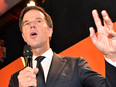 Prime Minister Mark Rutte of the free-market VVD party speaks to his supporters after exit poll results of the parliamentary elections were announced in The Hague, Netherlands, Wednesday, March 15, 2017.