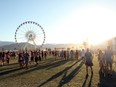 A view of music fans and the ferris wheel during day 3 of the 2016 Coachella Valley Music And Arts Festival Weekend 1 at the Empire Polo Club on April 17, 2016 in Indio, California.