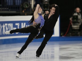 Tessa Virtue and Scott Moir, of Canada, skate their short dance at the World figure skating championships in Helsinki, Finland, on Friday, March 31, 2017.