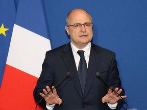 French Interior Minister Bruno Le Roux  makes a statement in Bobigny, near Paris on March 21, 2017.