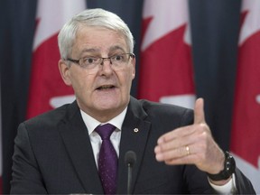 Minister of Transport Marc Garneau speaks at a news conference in Ottawa, Thursday, February 23, 2017