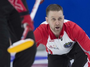 Skip Brad Gushue of Newfoundland-Labrador follows a shot during Friday's Page 1-2 Game at the Tim Hortons Brier in St. John's, N.L Gushue defeated Mike McEwen of Manitoba 7-5 to earn a spot in Sunday's final.