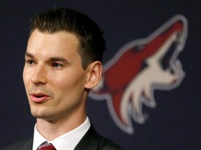 In this May 5, 2016 file photo, Arizona Coyotes general manager John Chayka speaks at a news conference in Glendale, Ariz.