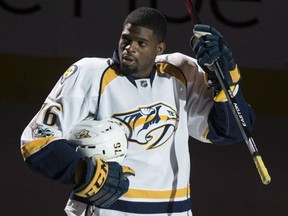 A teary-eyed Nashville Predators' P.K. Subban salutes the crowd as he is introduced prior to facing the Canadiens in Montreal on Thursday night.
