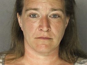 This photo provided by the Allegheny County Police Department in Pittsburgh shows Teresa Drum of Frazer Township, Pa., charged Tuesday, Feb. 28, 2017, with criminal homicide after police say she fatally shot her husband Dennis Drum Sr. on Monday, Feb. 27,  then took a cellphone photo of his body and showered before calling 911.