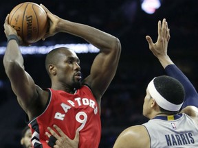 Serge Ibaka of the Toronto Raptors, left, looks to make a play with the ball during NBA action Friday in Detroit. Ibaka had 17 points in Toronto's 87-75 victory. Defending is Tobias Harris.
